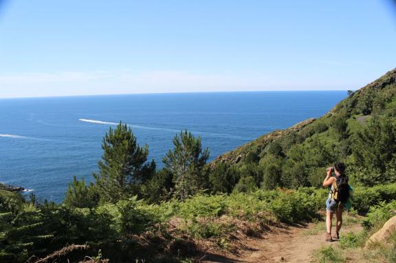 Hiker in front of the Cabtabrian Sea