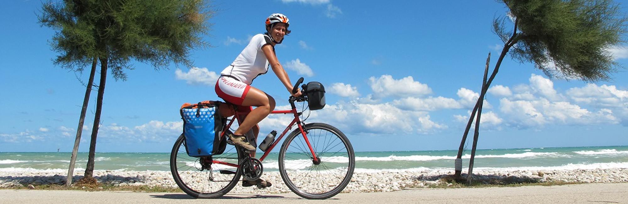 Cyclist on the coast of apulia