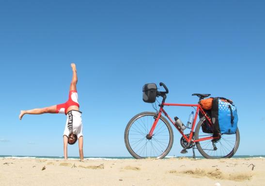 Cyclist in Apulia beach