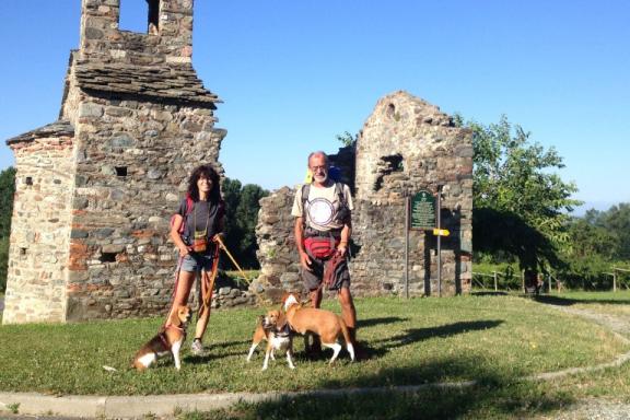 Pilgrims with dog in Via Francigena