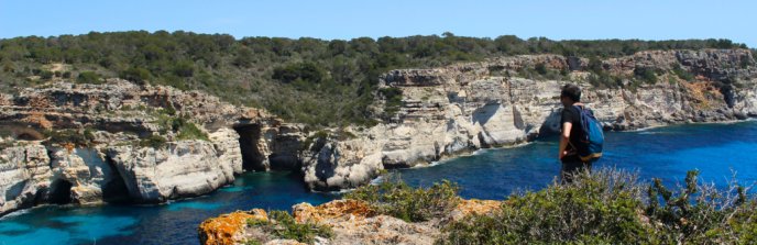 Walking looking out over Menorca cove