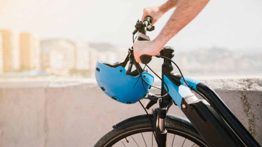 Part of blue and black electric bike