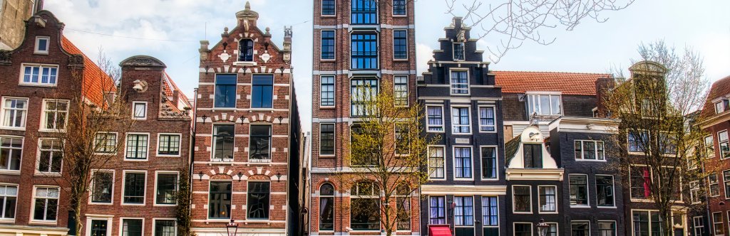Typical Dutch houses in Herengracht canal in Amsterdam