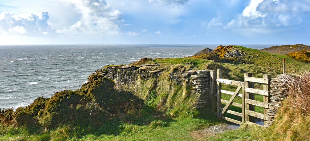Fence in the SWCP, with the sea behind